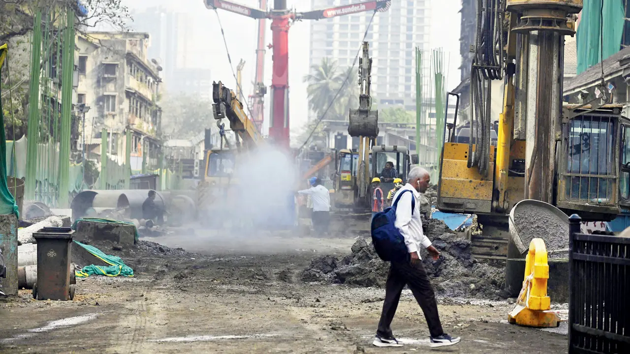 A mist cannon sprays water at the Elphinstone bridge construction site in Prabhadevi, with the BMC stepping up dust-control measures earlier this month