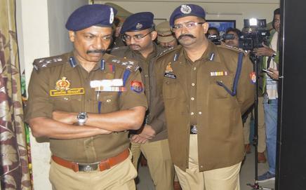 Police inspect the site after three minor sisters allegedly died by suicide in Ghaziabad on Wednesday. Pic/PTI