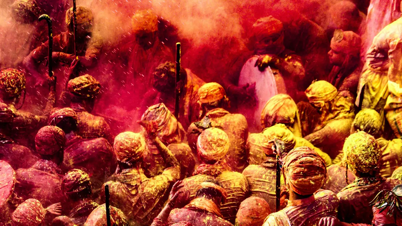 Devotees participate in Holi Utsav at Banke Bihari Temple in Vrindavan