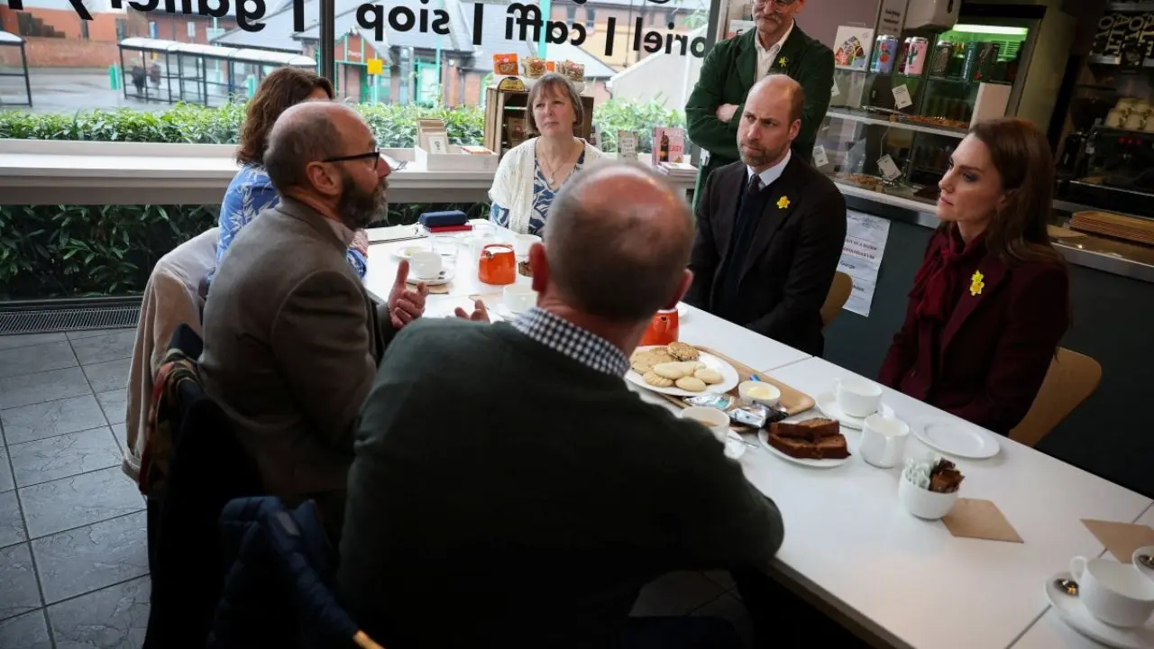 The royal couple sit in a café during a visit to Oriel Davies, a public contemporary art gallery in Newtown
