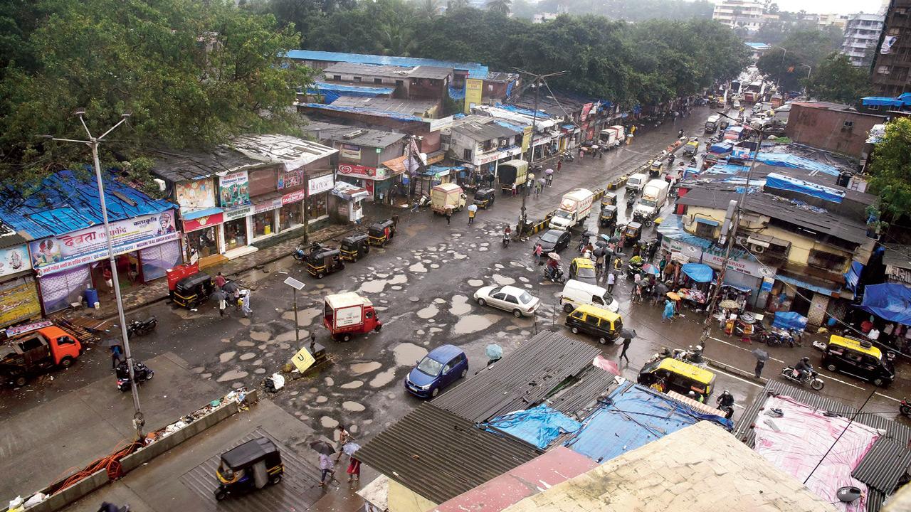 Potholes at Sant Rohidas marg in Dharavi. FILE PIC/ATUL KAMBLE