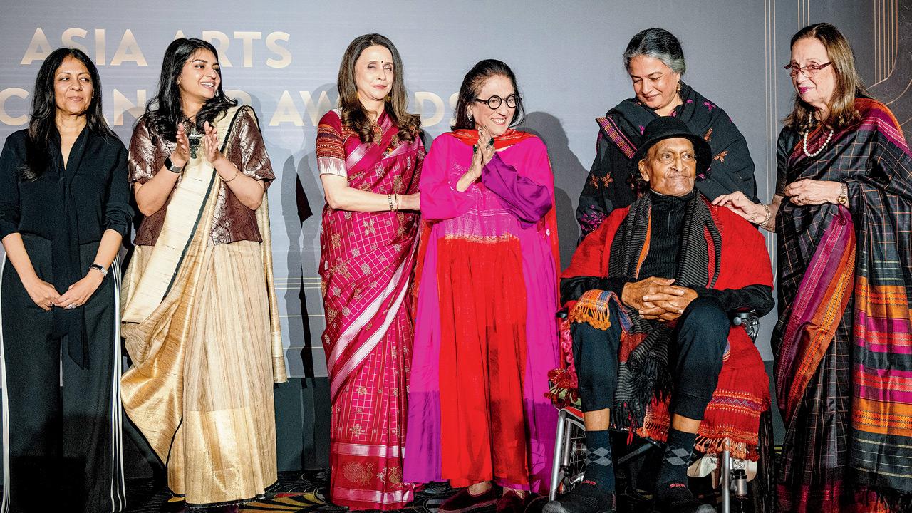 (From left) Radhika Chopra, Nupur Dalmia, Anu Menda, Kiran Nadar, Gurmeet Rai, Raghu Rai, and Pheroza Godrej. Pics courtesy/Asia Society India Centre