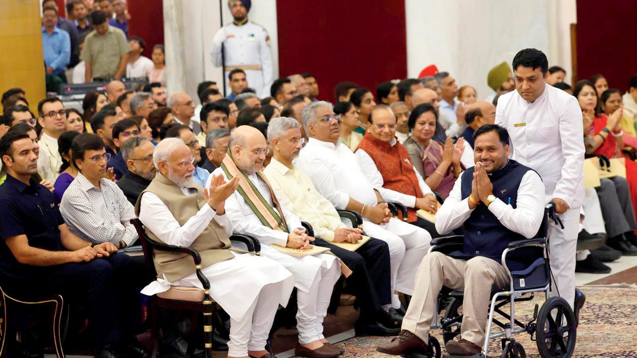 Para-swimmer Satendra Singh Lohiya with Prime Minister Narendra Modi