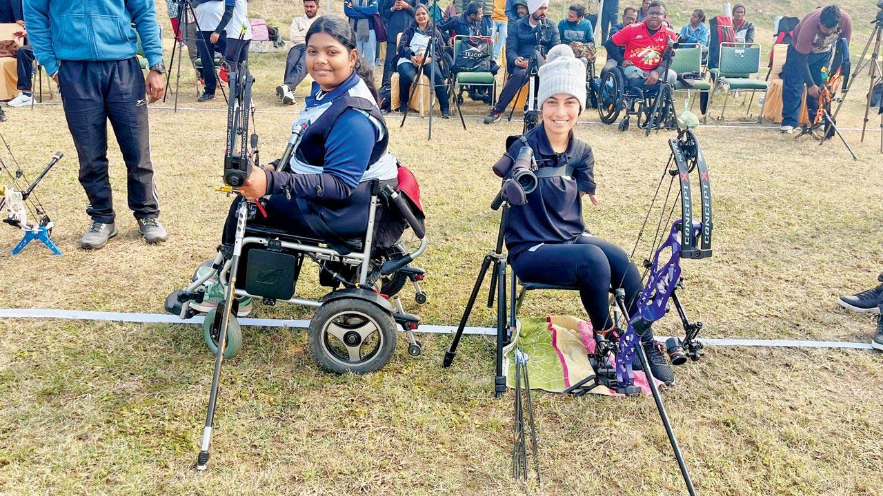 Rutvi Lolge (left) and world champions Sheetal Devi are all  smiles before their 1/16 elimination match in Patiala on Saturday