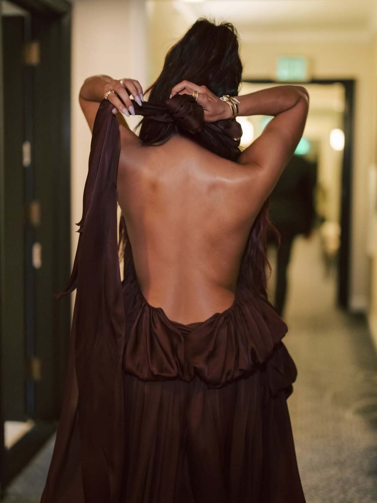 Priyanka Chopra Jonas turns heads as she flaunts her elegant backless outfit, blending boldness with timeless glamour.