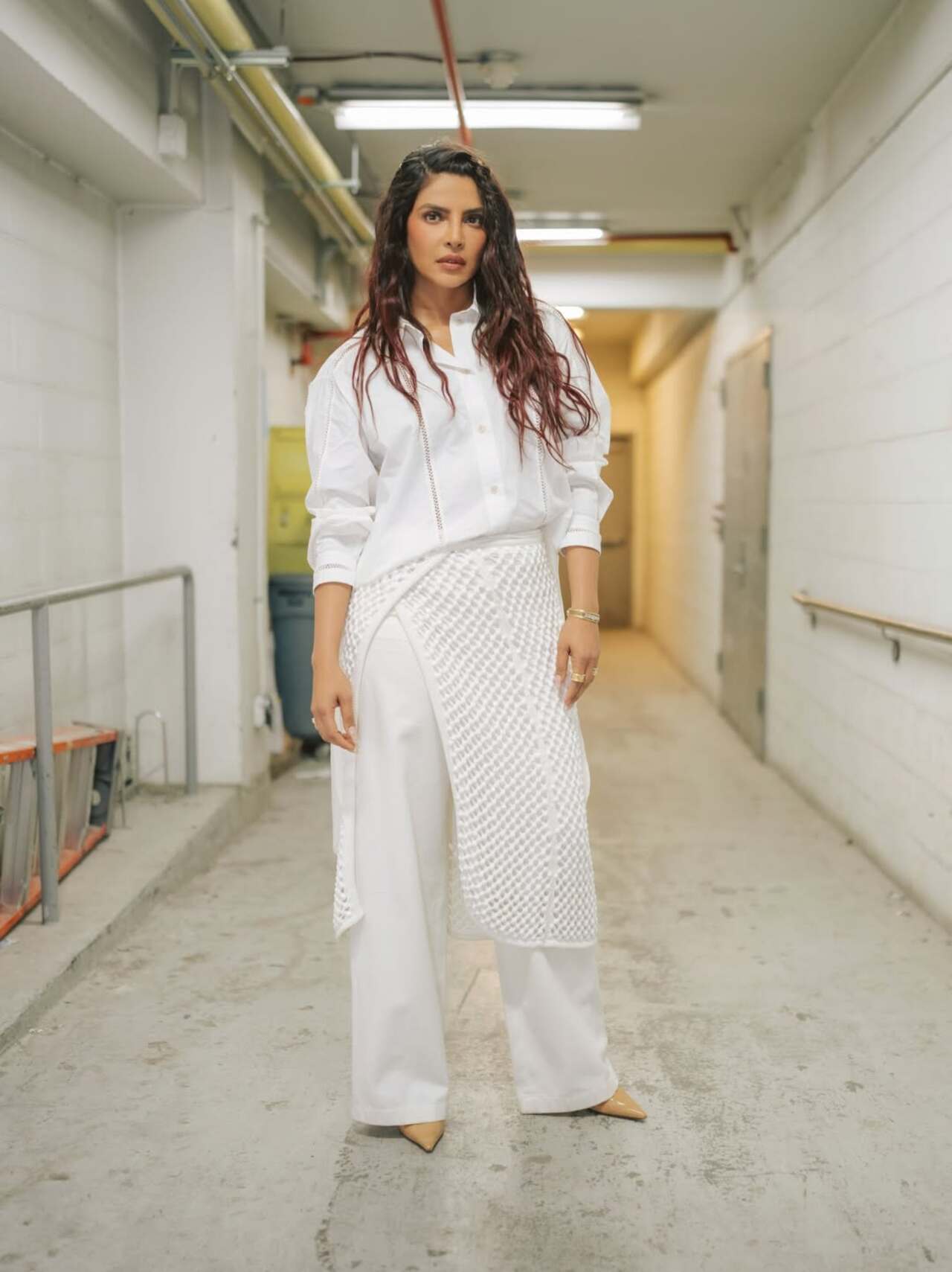 With this look, PeeCee proves that she can make even an all-white look feel commanding and runway-ready. She aced power dressing with a dash of glam and we just can't take our eyes off her.