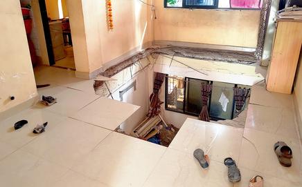 The section of flooring on the fifth floor of Nutan Neelam Apartment in Thane that collapsed early Tuesday