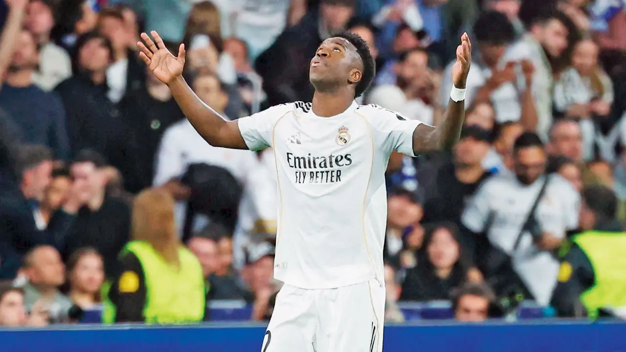 Real Madrid’s Vinicius Jr celebrates scoring against Benfica on Wednesday. Pic/AFP