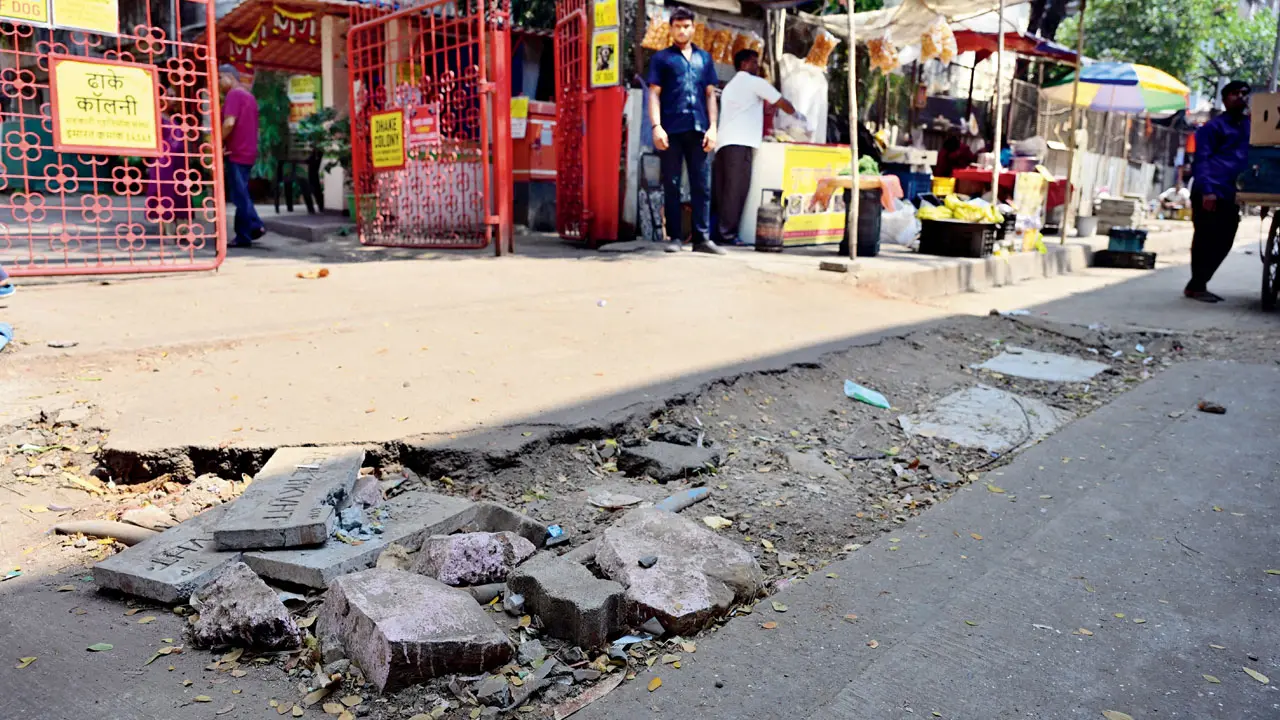 Andheri's Dhake Colony gate left in shambles weeks after cabling work completion