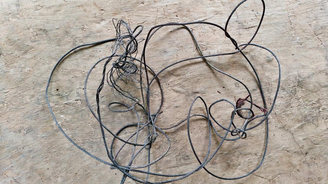 Metal wire he was trapped in