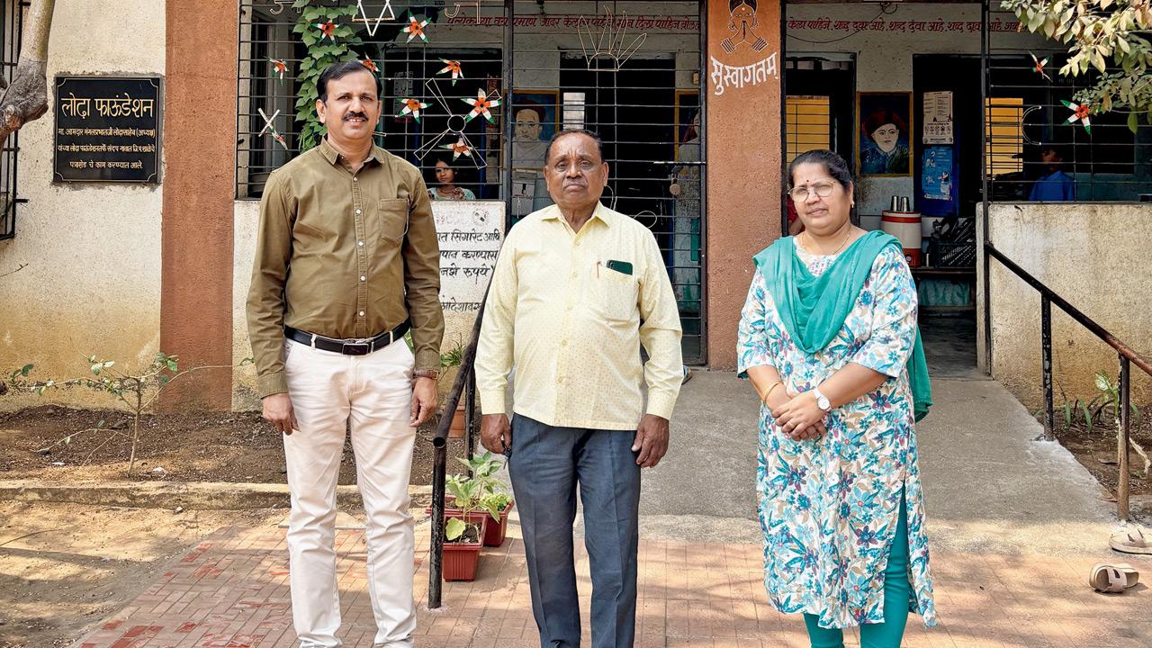 (From left) Teacher Girish Thakare with alumnus Anant Tukaram Patil and teacher Chitra Bhalerao at the Sandap ZP school in Dombivli East