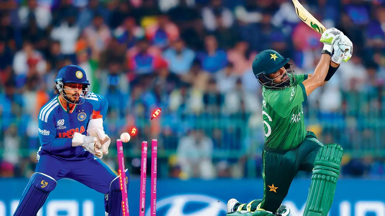 Pakistan’s Babar Azam is clean bowled by Axar Patel. Pic/Getty Images