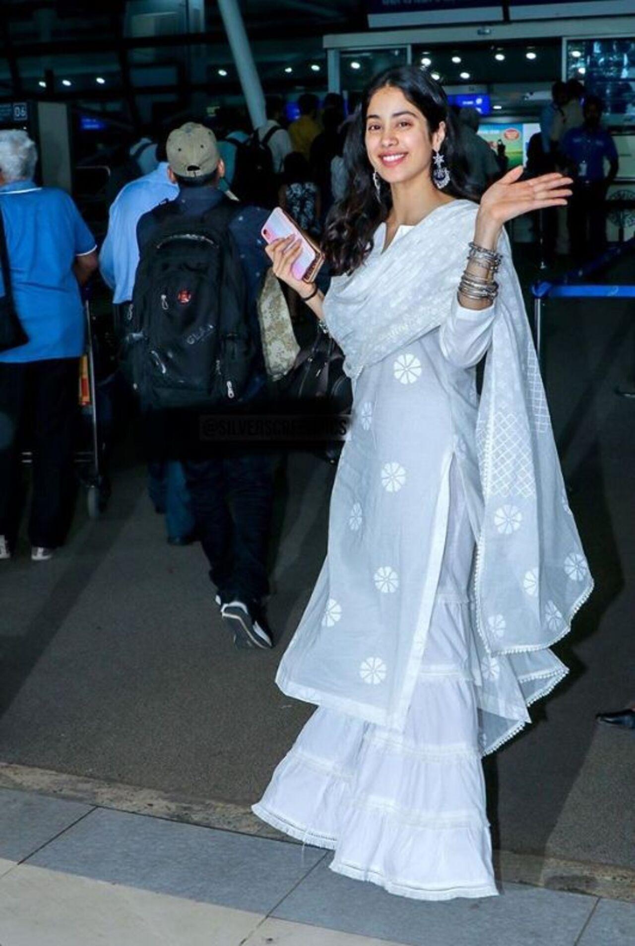 If you're planning on iftaar hopping, then keep it easy breezy yet stylish like Janhvi Kapoor in this three-piece set featuring a block-embroidered kurta, a sharara, and a dupatta. Pair it with heavy earrings and bangles to make a statement.