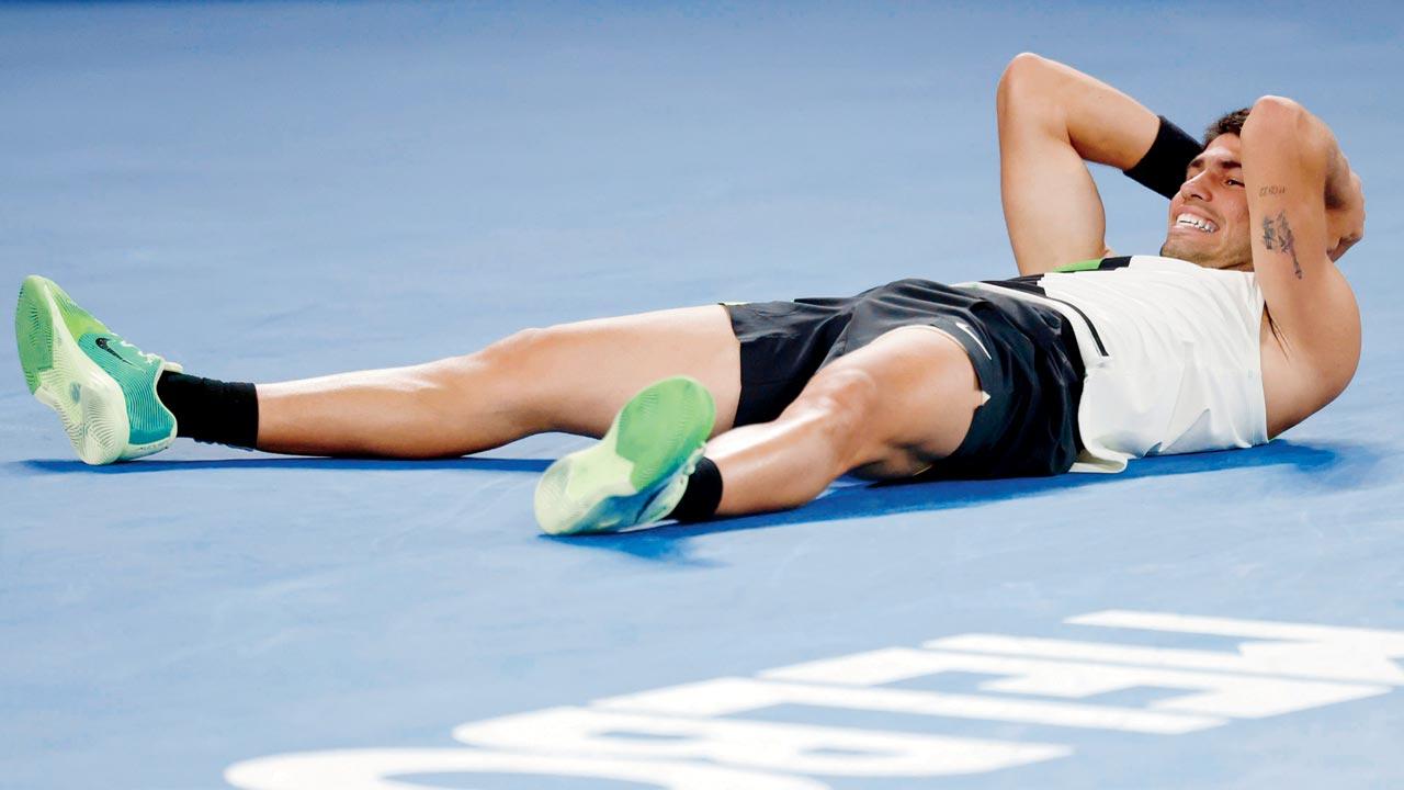 An ecstatic Carlos Alcaraz celebrates after his victory on Sunday
