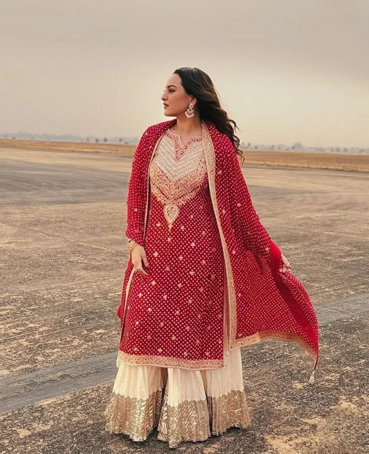 Sonakshi Sinha's vibrant red Bandhani print sharara suit with intricate embroidery and sequin work is for all the new brides out there. 