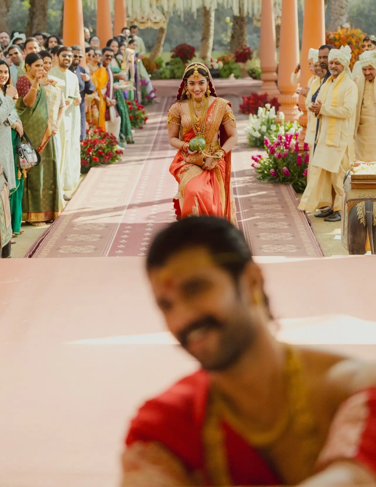 Rashmika was seen walking down the aisle as Vijay excitedly waited for his bride to arrive with his back facing her.