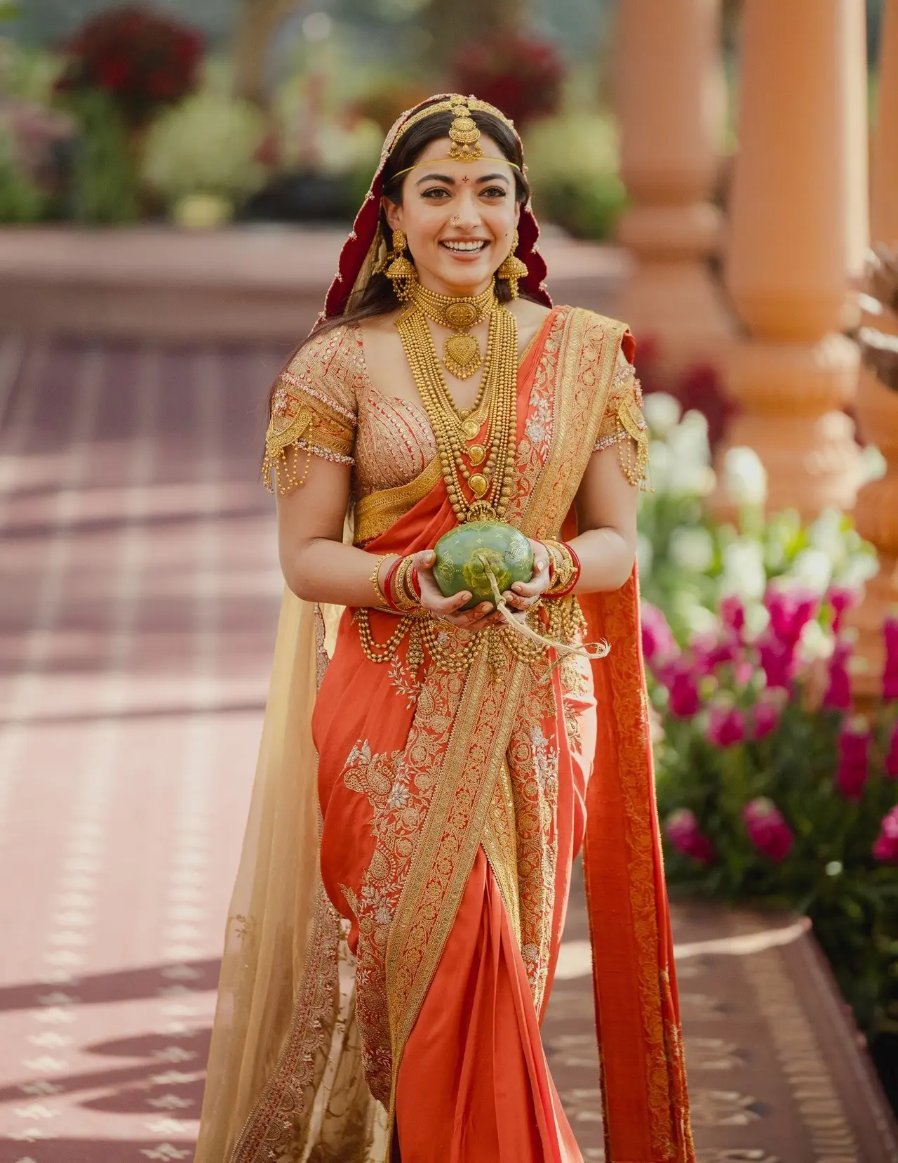 Rashmika looked ethereal as she walked down the aisle as the groom patiently waited for her in the mandap.