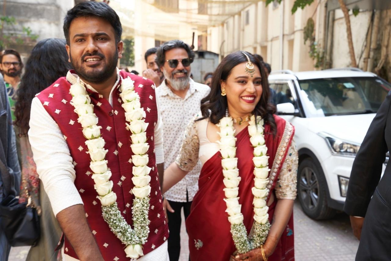 They look happiest in their first walk as man and wife as they leave the venue after thrie civil wedding ceremony.