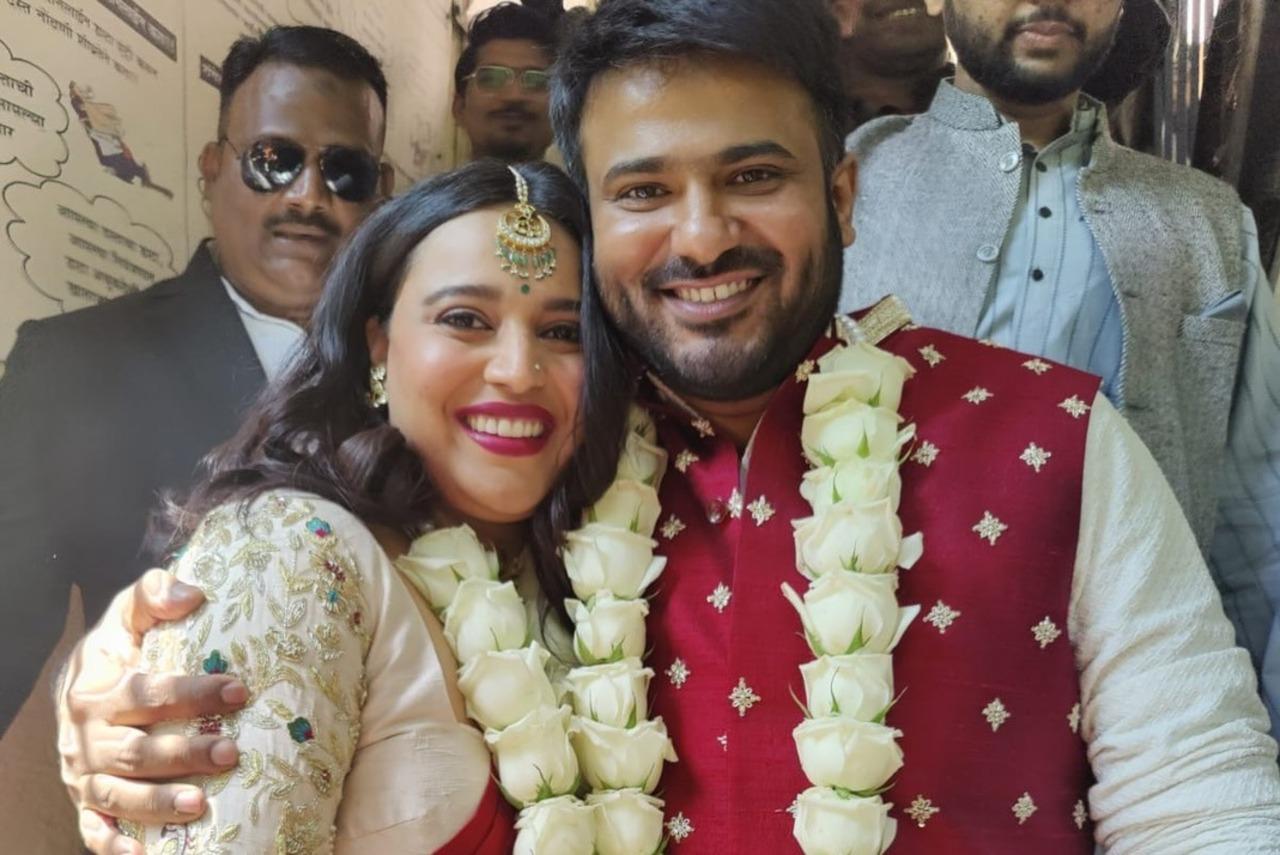 Fahad holds his bride close as they radiate the newly married glow after their civil wedding ceremony.
