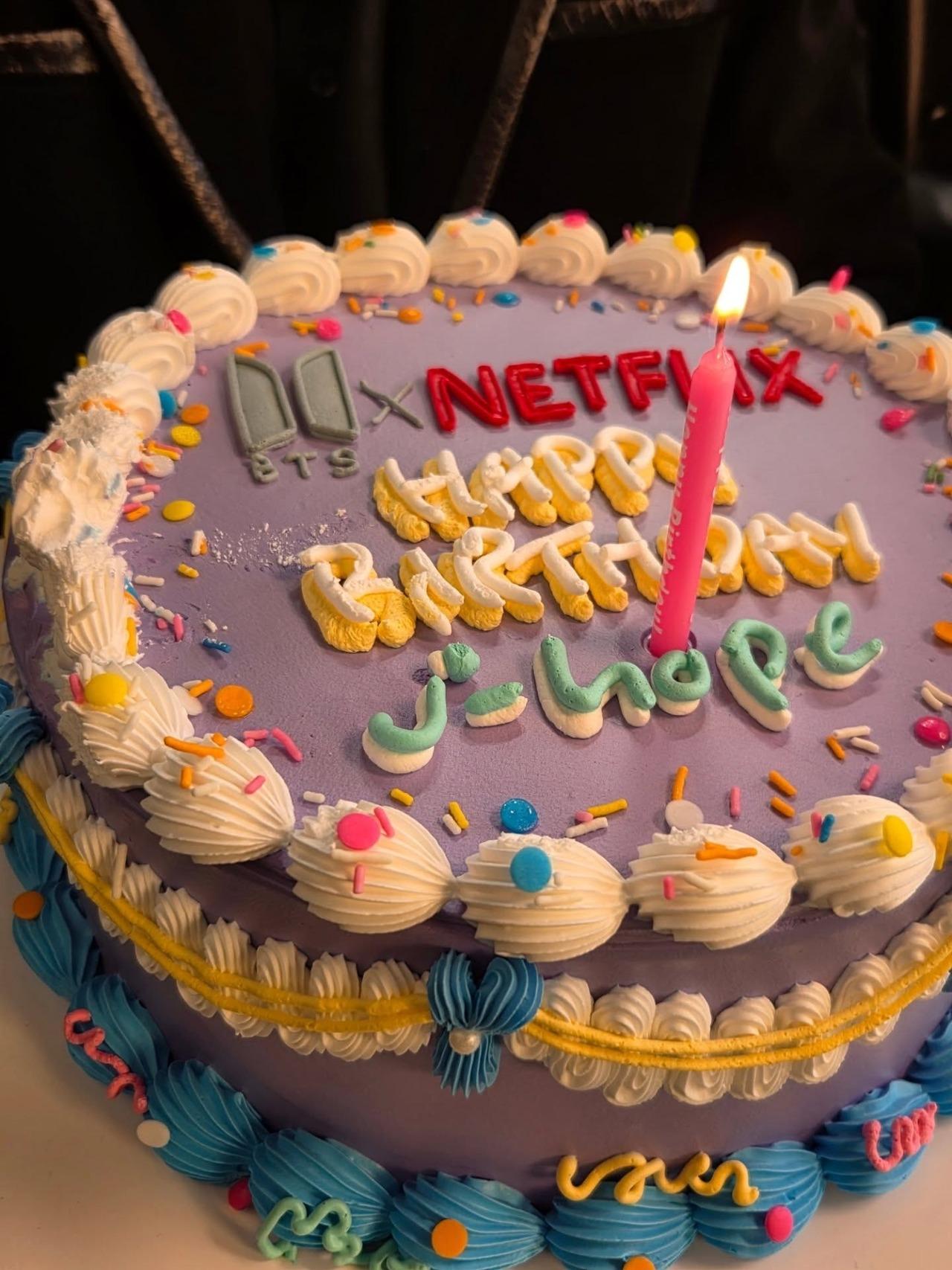 He also received this Pinteresty cake, marking BTS and Netflix's collaboration for the streaming of their live concert.