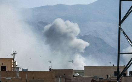 A plume of smoke rises following a reported explosion in Tehran on February 28. Pic/AFP