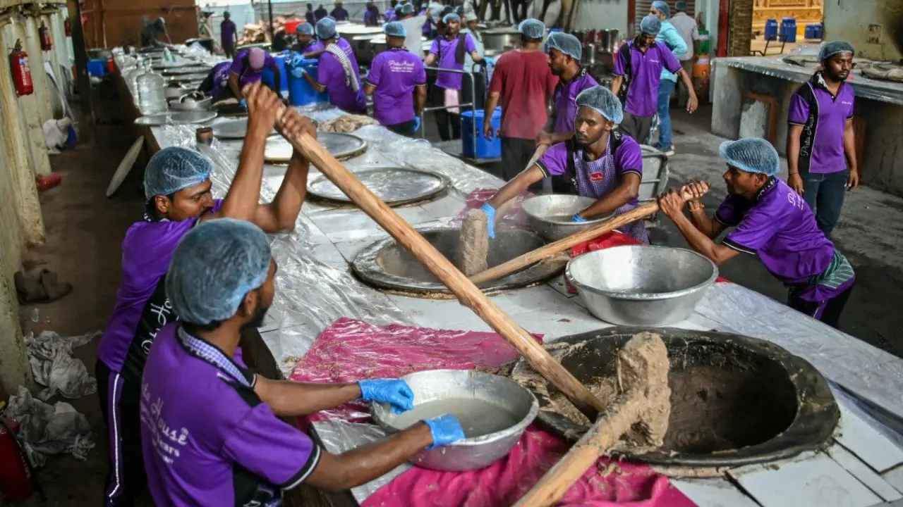 Cooks prepare traditional haleem, a slow-cooked blend of lamb and wheat, in a bustling Hyderabad kitchen, as demand for the dish spikes during Ramadan. The iconic dish continues to dominate the city’s iftar tables during the festivities