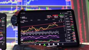 Sensex and Nifty open higher but slip into red amid selling pressure