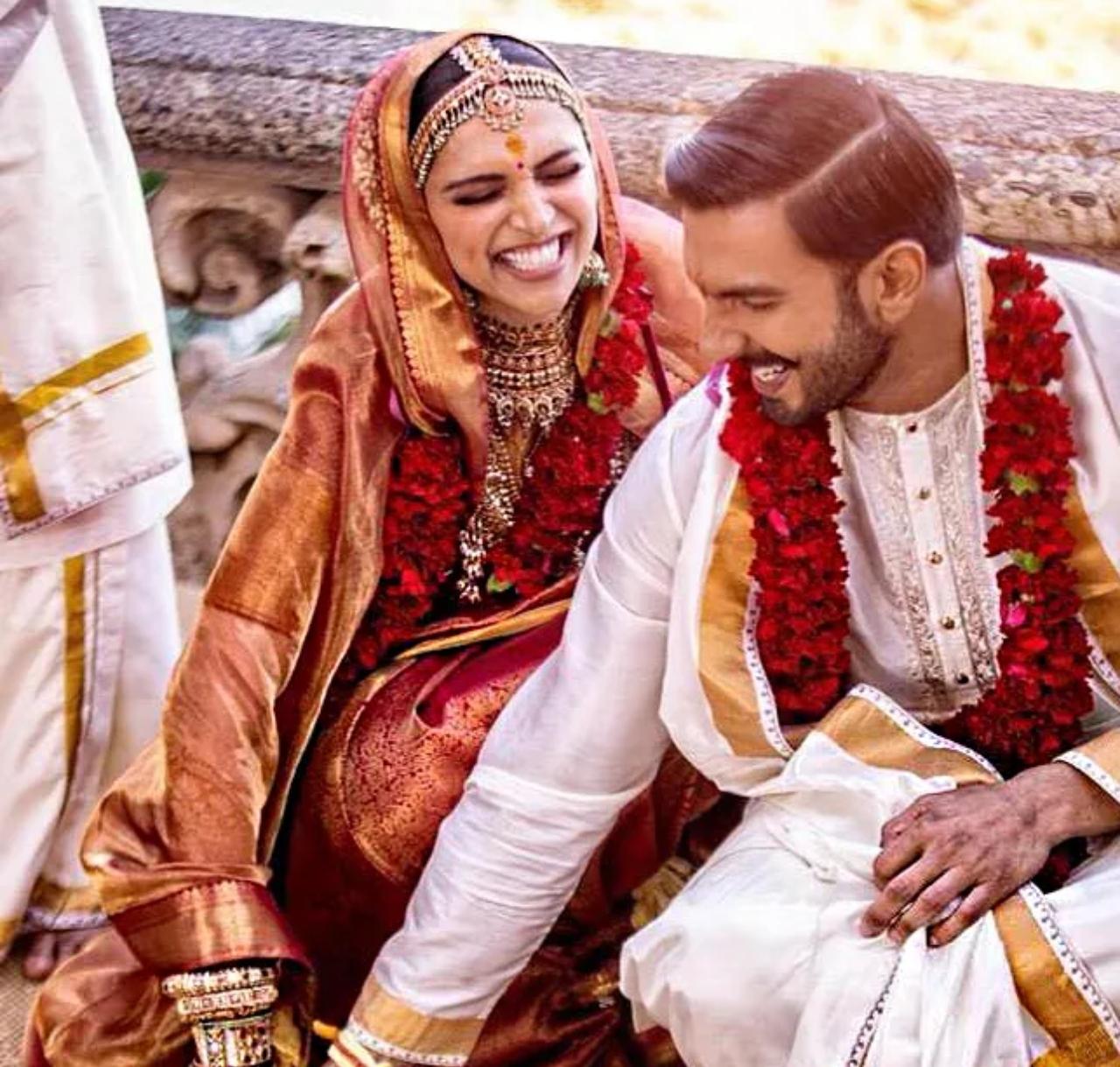For her Konkani wedding, Deepika Padukone served a lesson in traditional bridal grace. She wore a rich crimson Kanjeevaram saree, with intricate gold zari work, complemented by layers of temple jewelry, including a bold choker and a matha patti.
