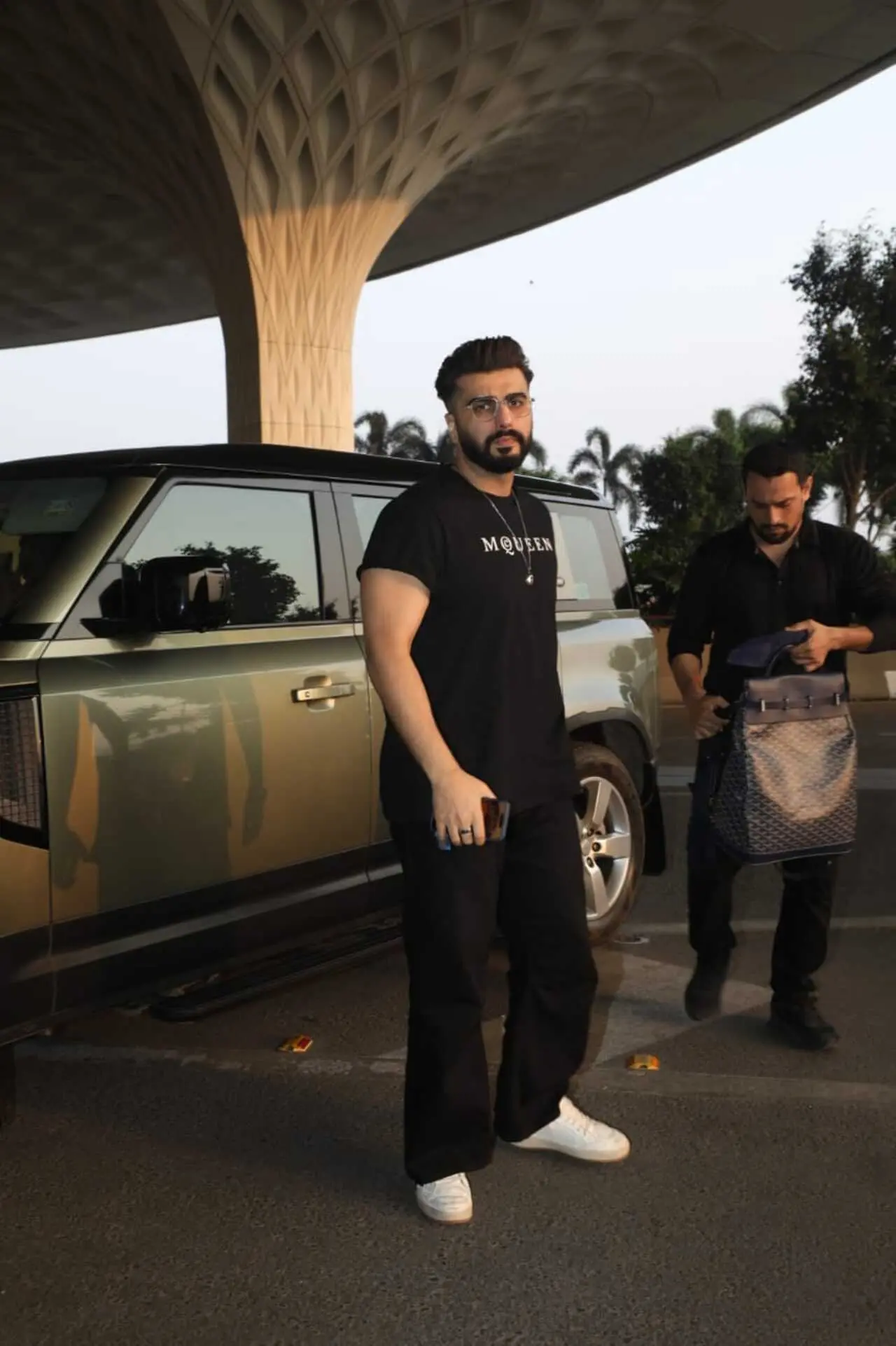 Arjun Kapoor adds charm to the all-black look to catch a flight