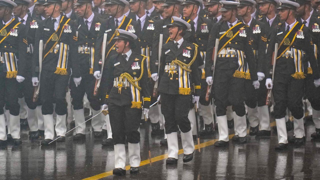 Indian Coast Guard (ICG) contingent continue rehearsals as repeated peals of thunder echoed across the ceremonial boulevard. PICS/PTI