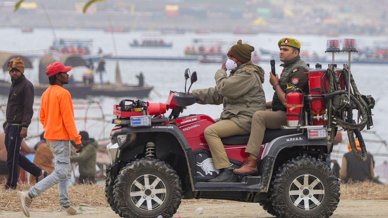 Security personnel carry out patrolling to maintain vigil during the religious gathering.