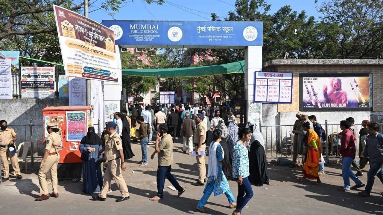 IN PICS| BMC Election 2026: Cops maintain strict vigil at Malwani polling booth