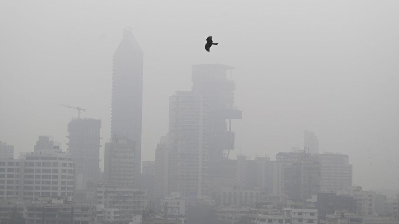 The city coastal road skyline appeared muted and grey as visibility dropped sharply due to heavy smog intensifying pollution levels across Mumbai