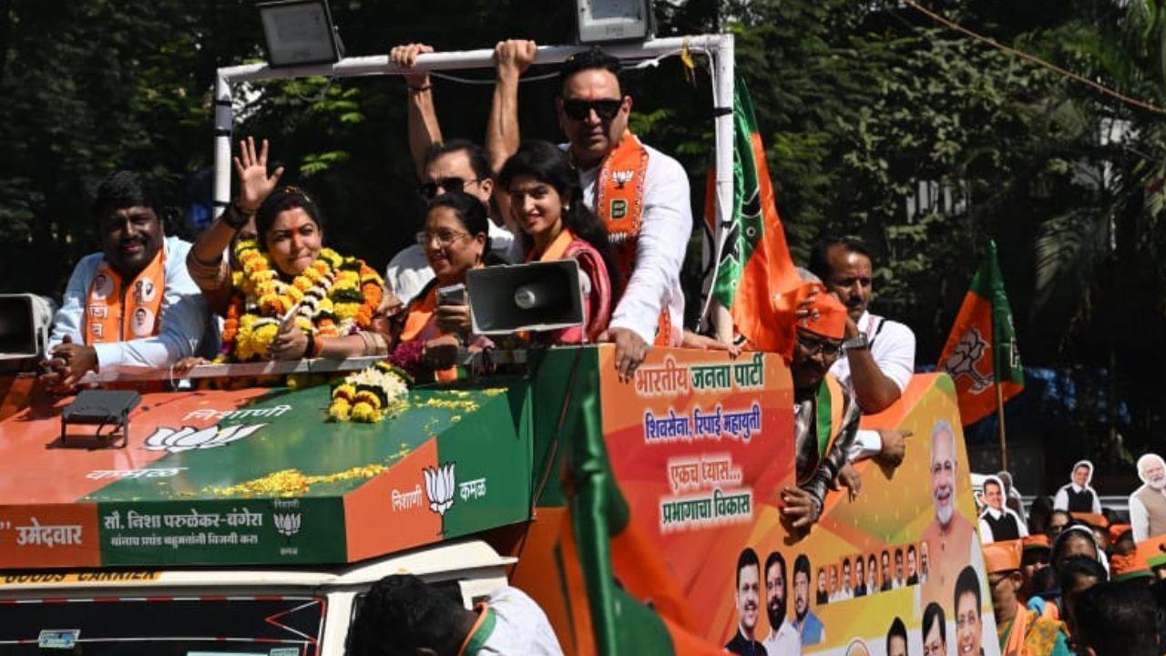 BJP candidate Nisha Parulekar-Bangera was in an open-roof car along with other BJP leaders