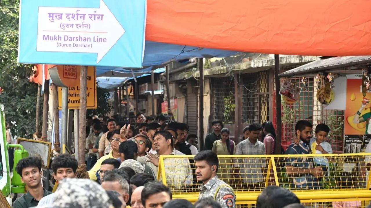 Huge number of devotees continued to walk towards Siddhivinayak temple in Dadar on Thursday