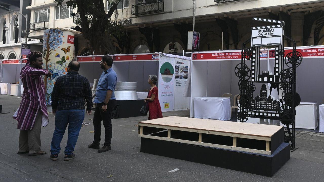 <p>Team members setting up craft stalls and painting corners for the Kala Ghoda Art Festival.</p> <p>Team members setting up craft stalls and painting corners for the Kala Ghoda Art Festival.</p>