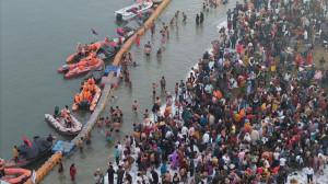 IN PICS: Devotees take holy dip in Ganga River on first day of Magh Mela
