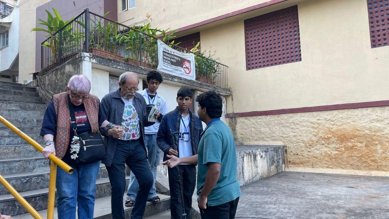 Elderly residents from Pali Hill, Bandra, reach the polling at ward number 100 complained that they were unable to access wheelchairs. Following their complaint, NSS students volunteering at the polling station, helped the elderly residents (Pic/Madhulika Ram)