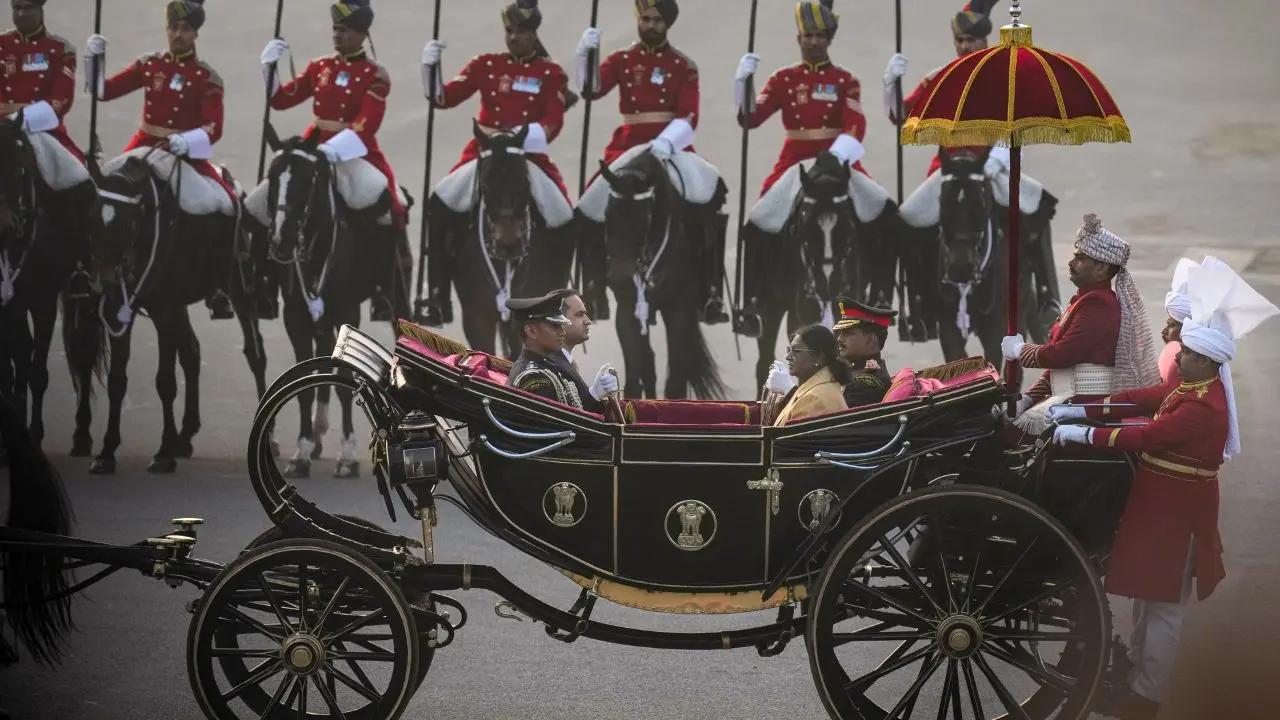 President Droupadi Murmu seen arriving in a ceremonial carriage at the Beating Retreat ceremony at Vijay Chowk, in New Delhi