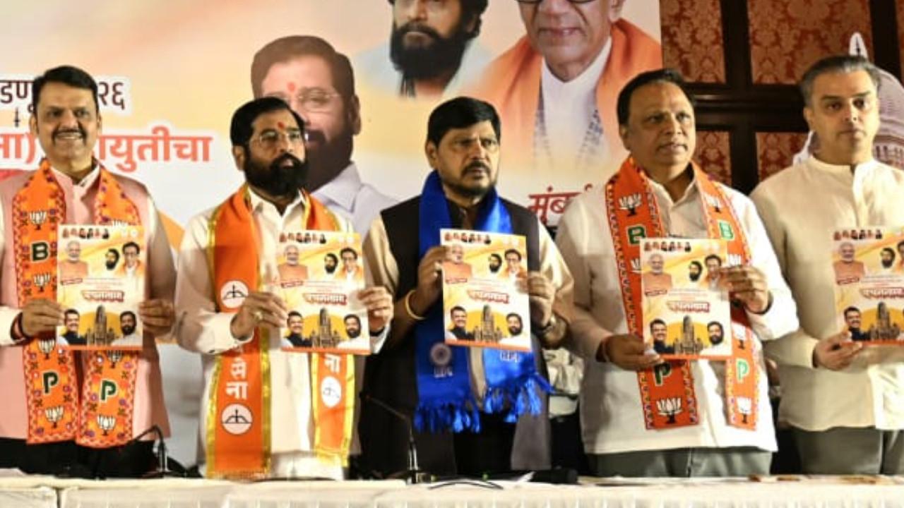 IN PICS: Fadnavis, Shinde and Athawale release poll manifesto ahead of BMC polls