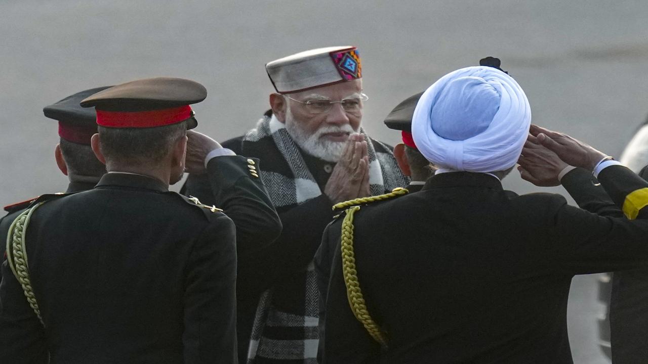 <p>&nbsp;Prime Minister Narendra Modi greets the military chiefs ahead of the ceremony</p>