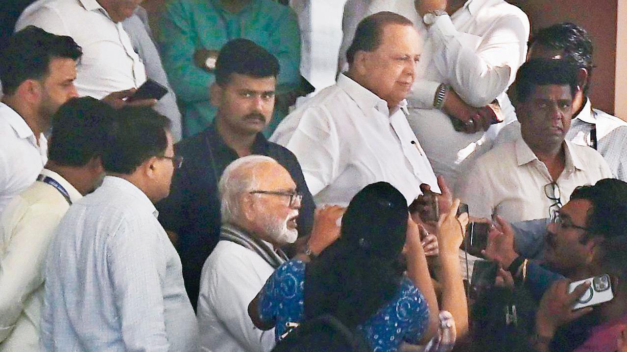 Senior NCP leaders Chhagan Bhujbal and Hasan Mushrif arrive at Lok Bhavan for the ceremony