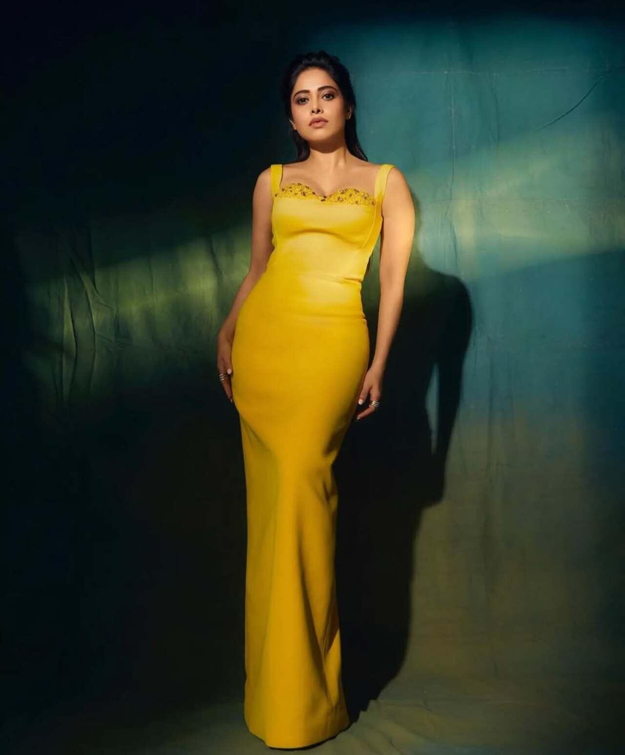 Nushrratt Bharuccha’s yellow dress appears vibrant and full of life. Her styling reflects the strength and calmness of the season. 