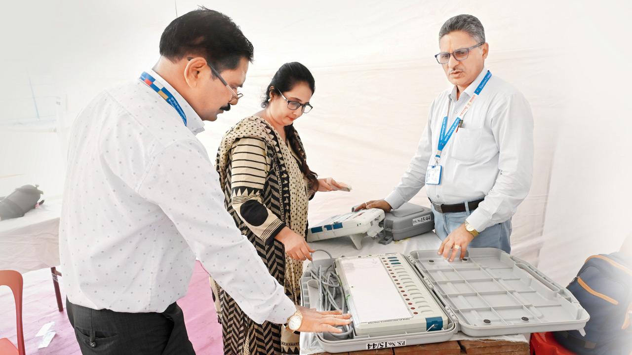Polling staff make final arrangements at 2,600 voting locations across Mumbai