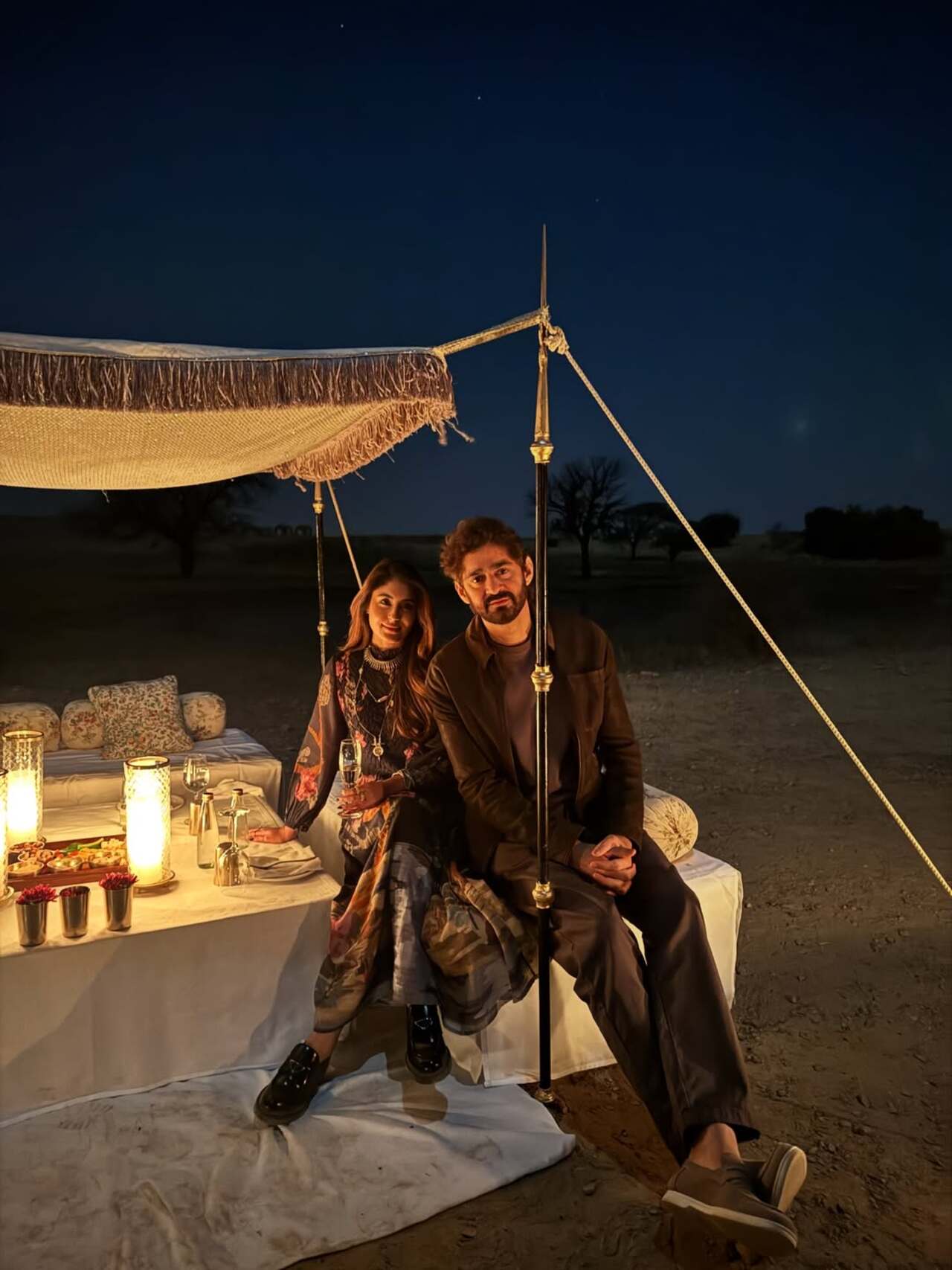 Kritika Kamra looked radiant as she posed with boyfriend Gaurav Kapur during a cozy night at the palace. They looked adorable twinning in black.