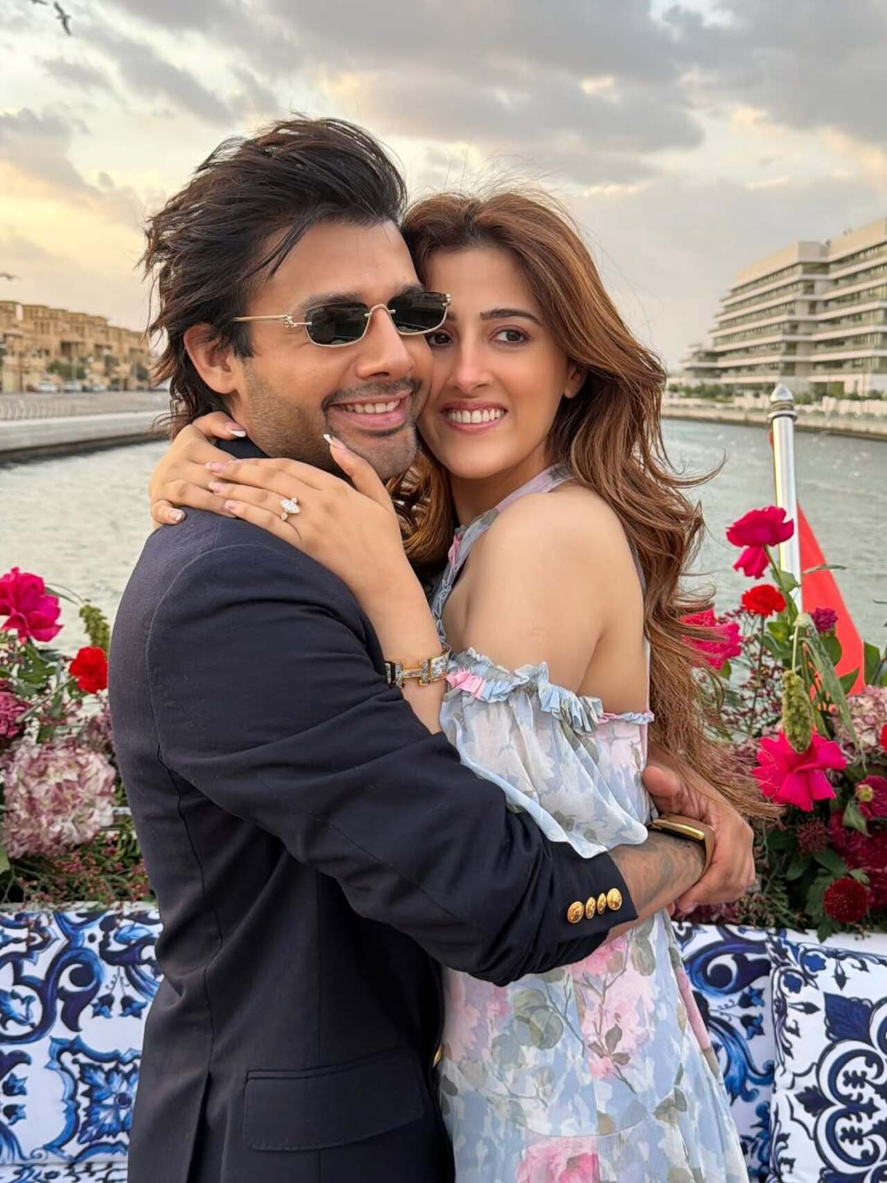 The newly-engaged couple was seen in the middle of a lake with a mesmerizing view in the backdrop. Dressed in a pretty floral dress, Nupur also flaunted her giant engagement ring. Stebin opted to wear blue formals for the special occasion.