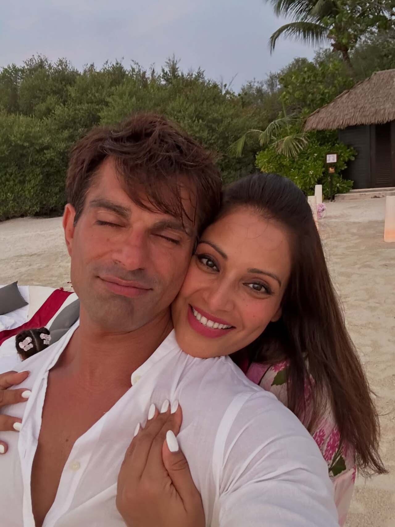 







Bipasha Basu and Karan Singh Grover flash bright smiles in a cozy selfie, capturing a candid moment filled with love, warmth and effortless couple goals.







