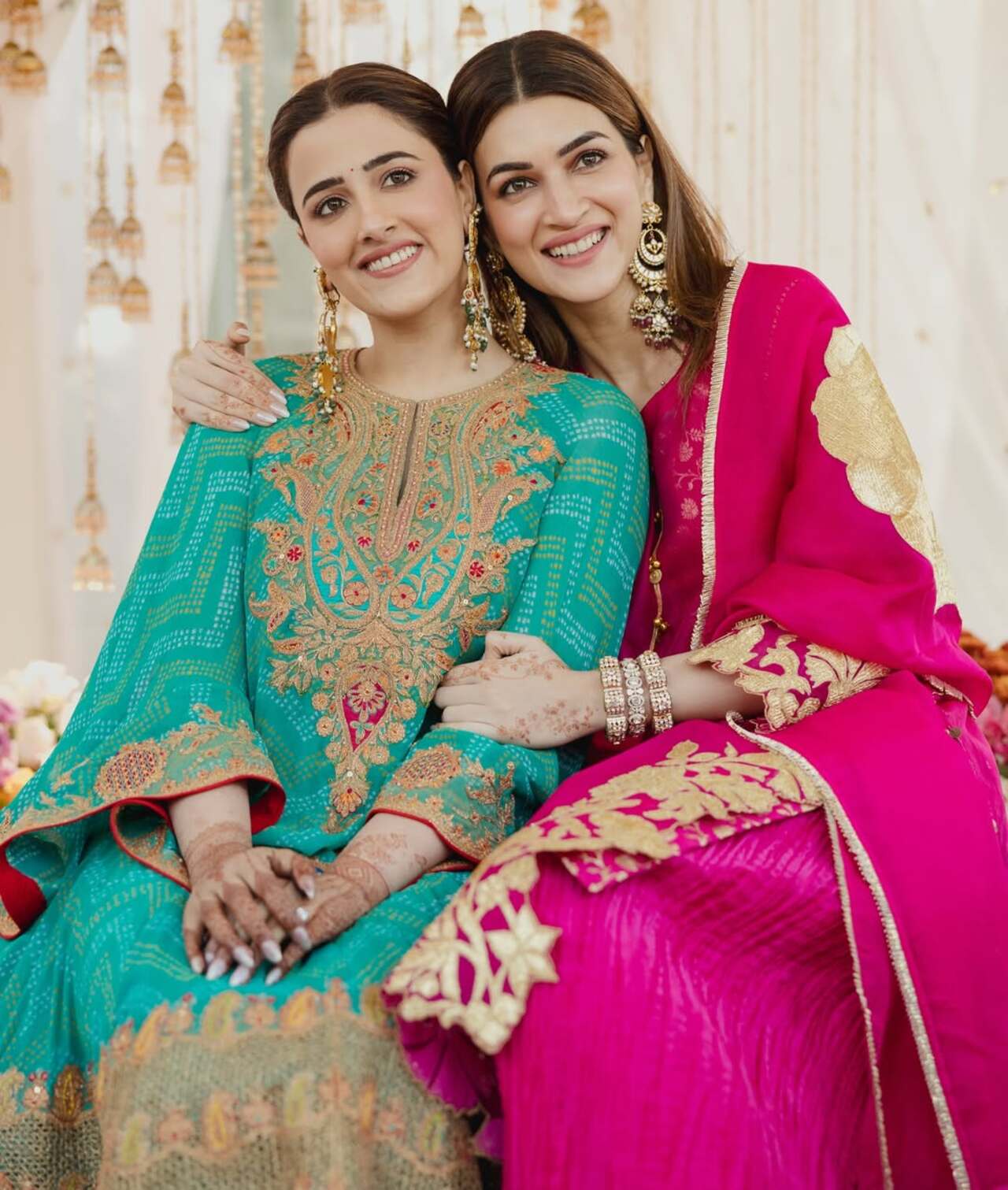 <p>For the rituals, Nupur looked stunning in a turquoise blue ethnic outfit, while Kriti rocked a fuchsia pink kurta set.&nbsp;</p>