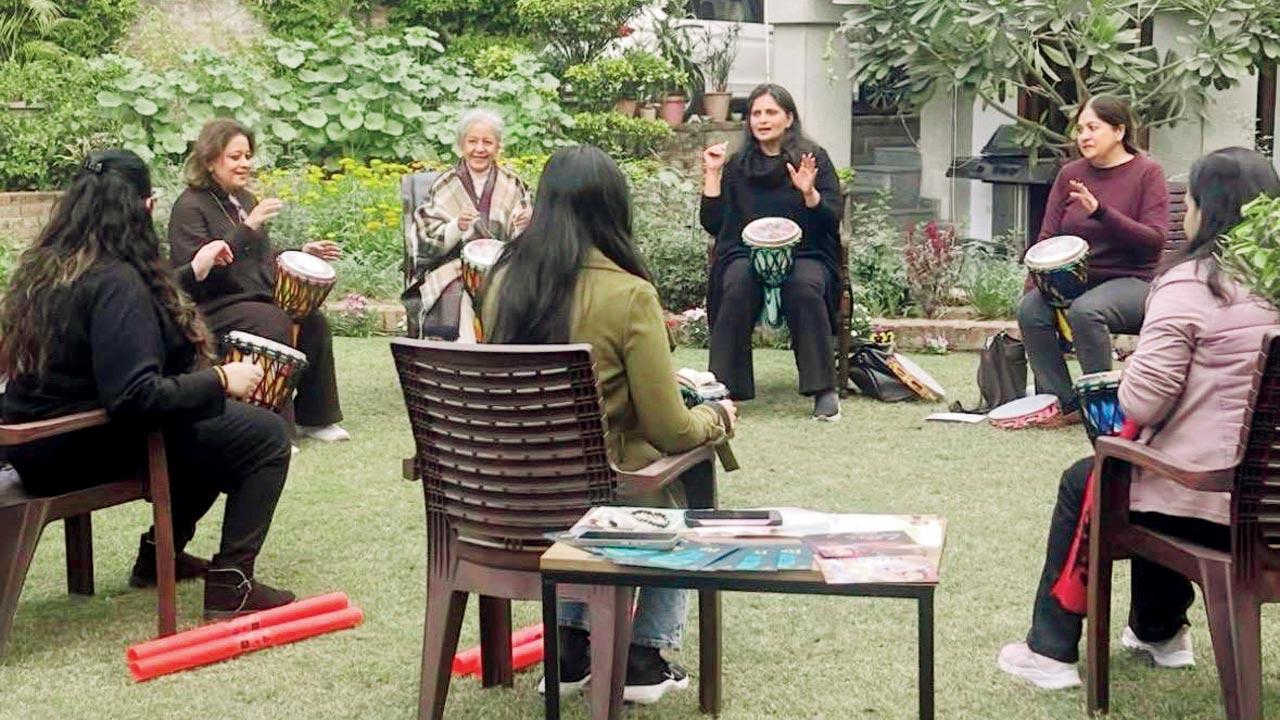 Participants gathered in a circle with their drums. Pics Courtesy/Komal Vaishnav