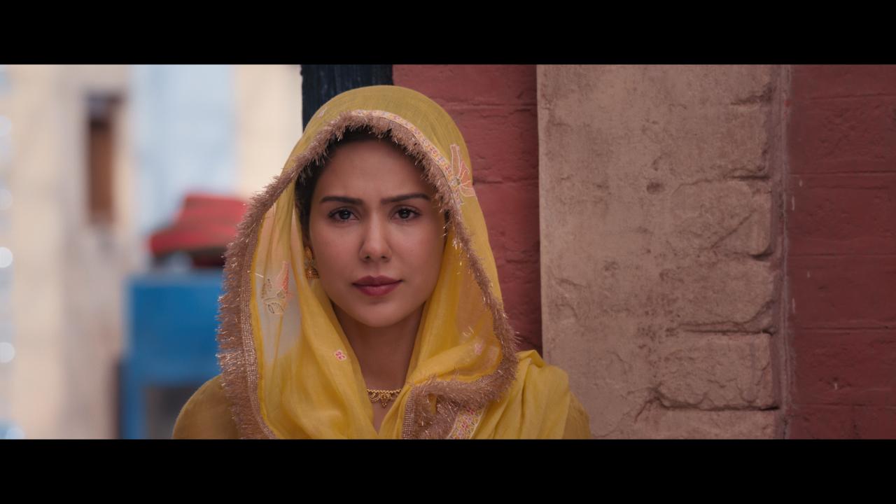 <p>Sonam Bajwa will be seen playing Manjit Sekhon, wife of Officer Nirmal. They are shown to be newly weds in the film when Dosanjh`s character heads for war</p>